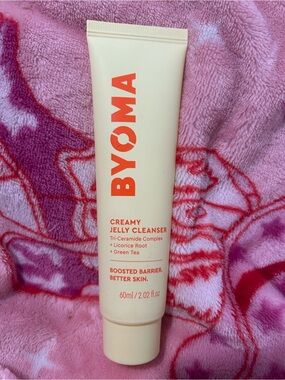 BYOMA Creamy Jelly Cleanser - Cream with Orange Text